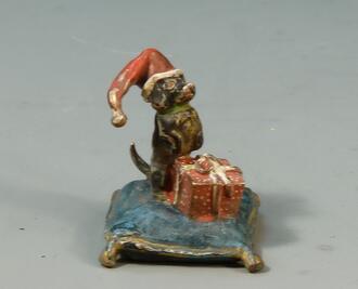 Статуэтка  "Такса с подарком на подушке "